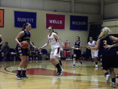 ROSER AND AKI LEAD EXPRESS PAST WILDCATS